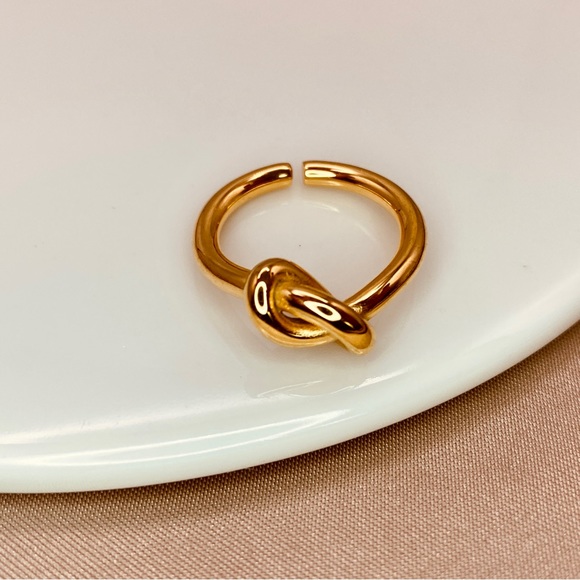 Minimalist Knot Open ring design in 18K Gold- Titanium Steel. - Picture 3 of 5